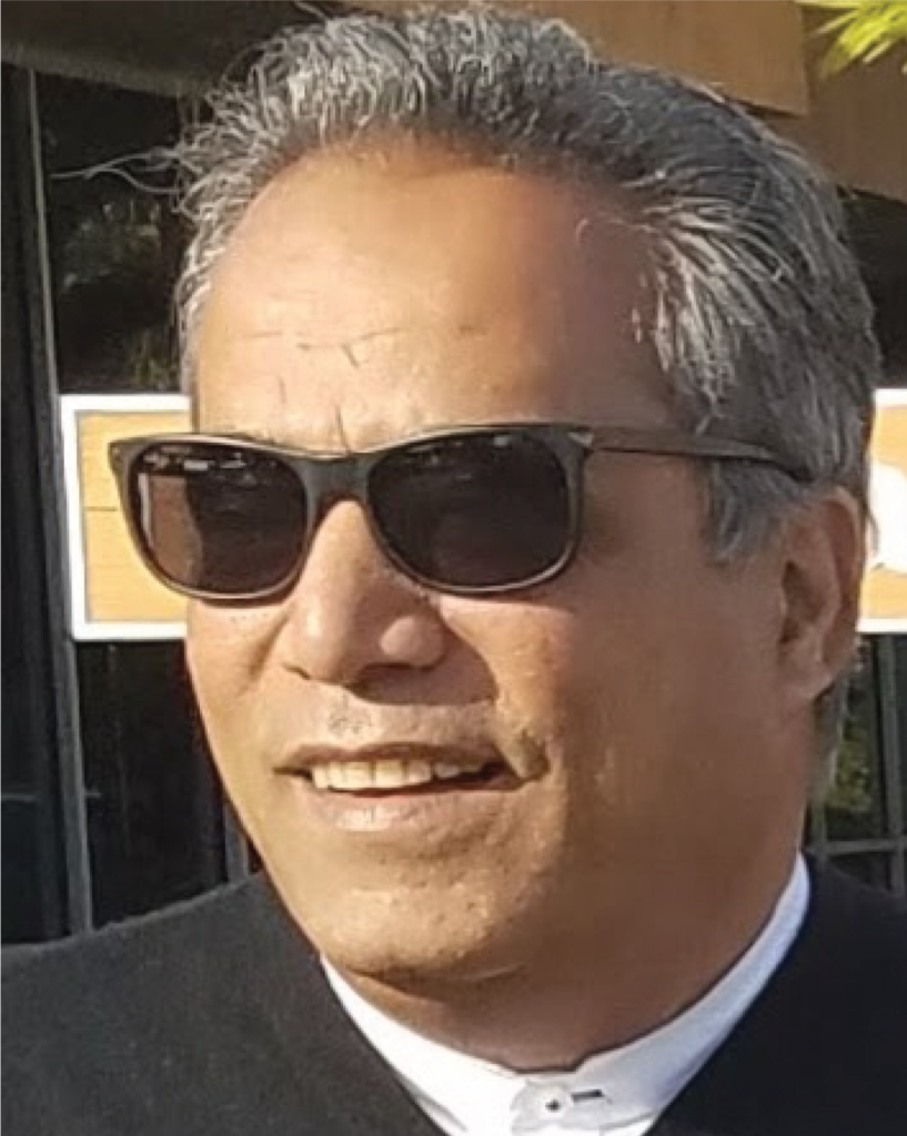 Headshot of Farrukh Sayeed, President